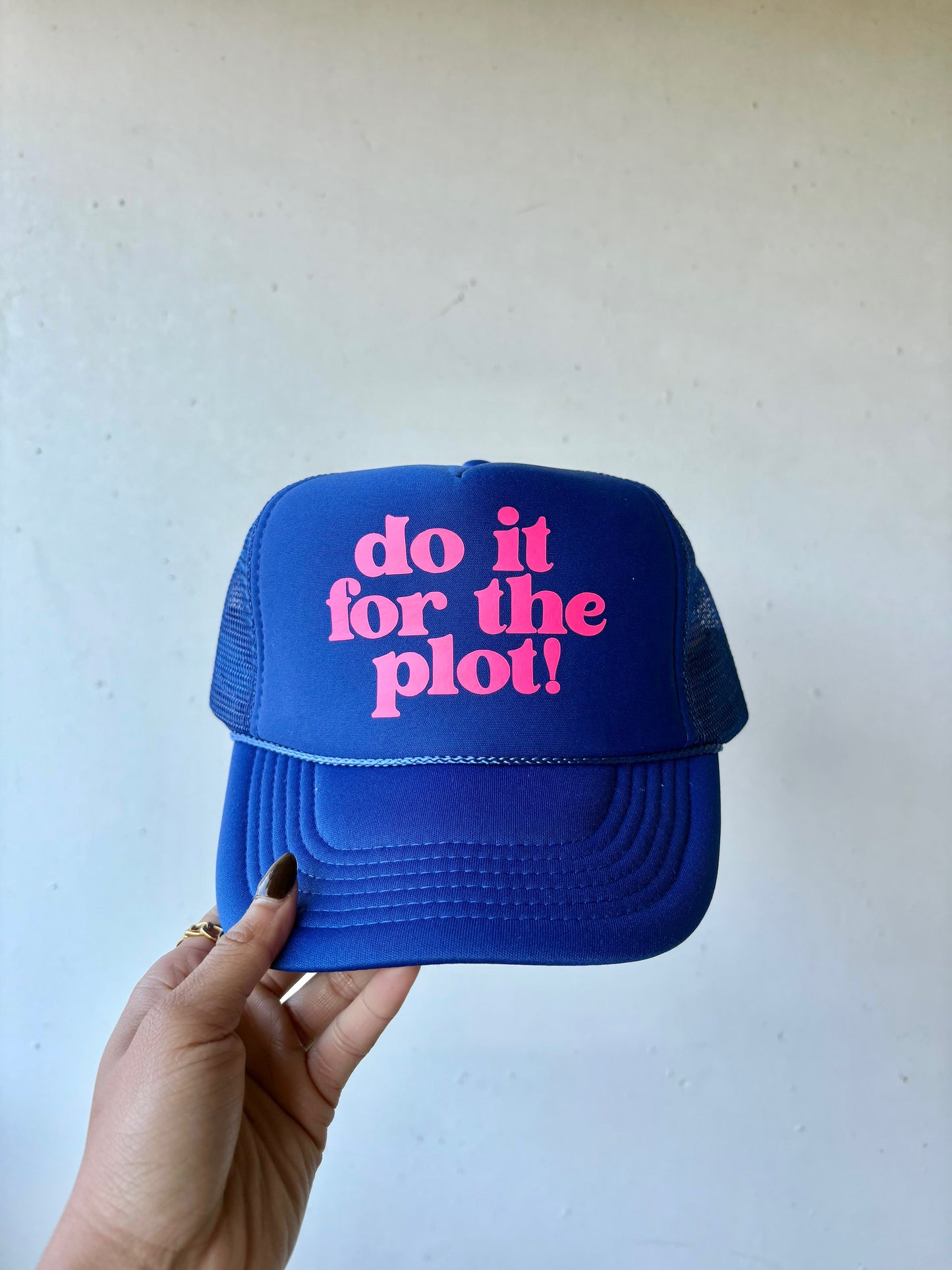 Do it for the Plot Trucker Hat